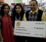 Urooj Khan pictured with wife Shabana Ansari, daughter Jasmeen and his $1 million winnings shortly before his death from cyanide poisoning