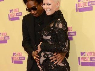 Amber Rose and her fiancé Wiz Khalifa welcomed their first child Sebastian Taylor Thomaz into the world on Thursday