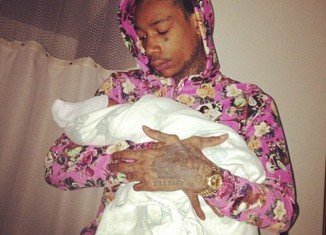 Amber Rose posted a picture of her new son, Sebastian “The Bash” Taylor Thomaz being cradled by his father Wiz Khalifa