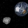 Asteroid 2012 DA14 darts past the Earth at 17,200 miles