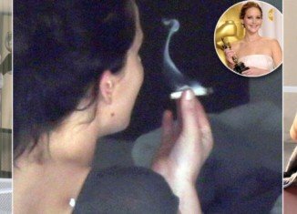 Jennifer Lawrence has been seen on holiday in Hawaii enjoying a suspicious rolled up cigarette
