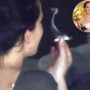 Jennifer Lawrence pictured enjoying a suspicious rolled up cigarette in Hawaii