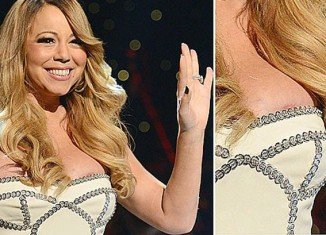 Mariah Carey was presenting the So So Def 20th Anniversary Concert in Atlanta over the weekend in a strapless dress, helping celebrate with pal Jermaine Dupree