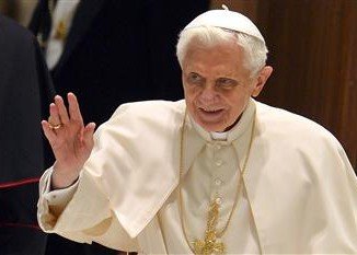 Pope Benedict XVI was cheered by crowds as he made his first public appearance since resignation announcement at a weekly audience