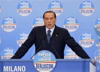 Silvio Berlusconi is trying to buy votes in Italy's election on Sunday by sending out letters promising a tax rebate,