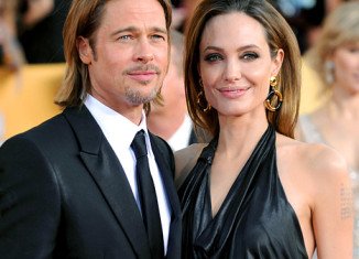 The National Enquirer claims Angelina Jolie told an astonished Brad Pitt that her former flame, Colin Farrell, put him to shame between the sheets