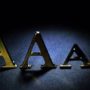 Moody’s cuts UK credit rating from AAA to Aa1