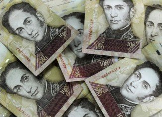 Venezuela has cut the value of its currency against the US dollar by 32 percent, in an effort to boost the country’s economy