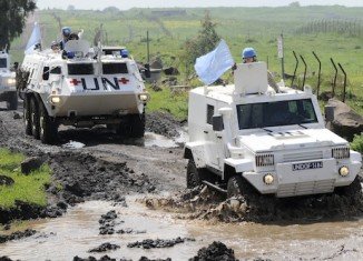 About 20 UN observers have been detained by about 30 armed fighters in the Golan Heights on the Syria-Israel border