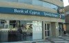 Bank of Cyprus depositors with more than 100,000 euros could lose up to 60 percent of their savings as part of the EU-IMF bailout restructuring move