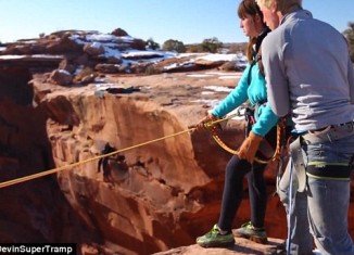 Creighton Baird pushed his cautious girlfriend Jessica Powell off the edge of a cliff to take a ride on a 400ft pendulum swing in a narrow canyon in Utah