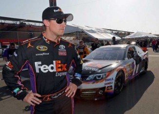 Denny Hamlin remains hospitalized overnight after being airlifted to a local hospital after a hard single-car crash at the inside wall on the final lap of Sunday's Auto Club 400