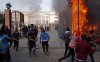 Fans had surged through the streets to attend a rally at their stadium, and a police club and the Egyptian football federation building were set alight in the chaos