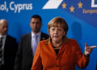 German Chancellor Angela Merkel warned Cyprus not to exhaust the patience of its eurozone partners