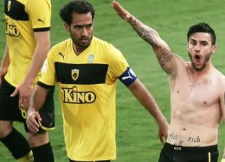 Greek football player Giorgos Katidis has been banned for life from playing for the national team after making a Nazi salute