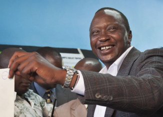 Kenyan Deputy PM Uhuru Kenyatta appears to have won the presidential election by the tightest of margins as the provisional results indicate