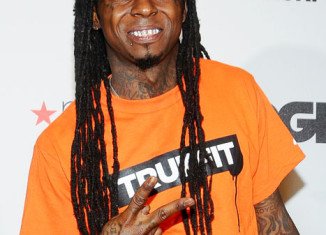 Lil Wayne is still in intensive care six days after being admitted to hospital suffering from uncontrollable seizures