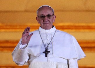 Pope Francis I has begun his first day at the helm of the Catholic Church, attempting to set out his vision for his papacy amid a testing schedule