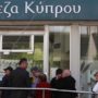 Cyprus eases some bank restrictions