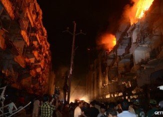 The blast in the mainly Shia Muslim area of Abbas Town destroyed several buildings and set others on fire