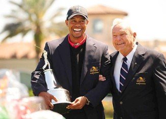 Tiger Woods has won the Arnold Palmer Invitational at Bay Hill by two strokes returning to the top of the world rankings for the first time since October 2010