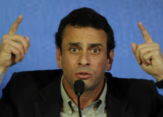 Venezuelan opposition leader Henrique Capriles has confirmed that he will stand in presidential elections on April 14