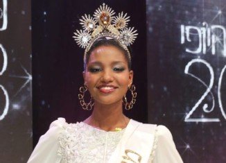 Yityish Aynaw, an immigrant orphan from Ethiopia, who became the first black Miss Israel last month, has been invited to Thursday's gala dinner with visiting President Barack Obama