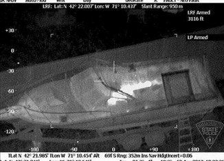 A video of Dzhokhar Tsarnaev capture shows a police robot ripping apart the tarp concealing the suspect and numerous flash bang grenades being thrown into the boat where he lay