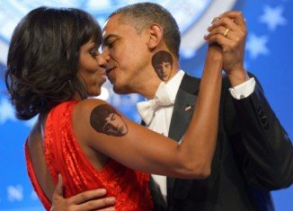 Barack Obama has warned his daughters Malia and Sasha that if they get tattoos, he and his wife Michelle will get matching ones on the same place on their bodies