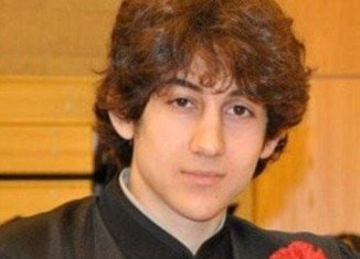 Dzhokhar Tsarnaev is “clinging to life” under armed guard in the same hospital where 11 of Boston Marathon bombings victims are still being treated