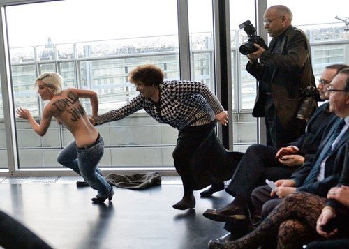 FEMEN activists stormed a conference attended by Tunisian President Moncef Marzouki in Paris