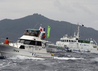 Japan’s PM Shinzo Abe has warned China that his country will respond with force if any attempt is made to land on disputed island