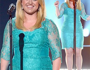 Kelly Clarkson's light blue mid sleeve mini dress appeared a tad too small on the 30-year-old American Idol star