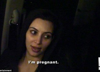 Kim Kardashian told sister Kourtney she was pregnant in the middle of the night
