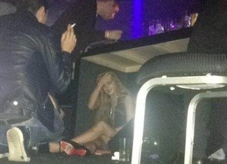 Last week Lindsay Lohan was spotted hiding under a table on the dirty floor of a Sao Paolo nightclub with her head in her hands