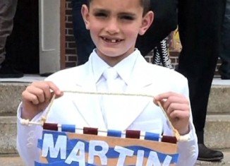 Martin Richard may very nearly have cheated death after walking out to embrace his father Bill Richard as he went to cross Boston Marathon finishing line