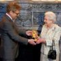 Bond girl Queen Elizabeth II receives BAFTA award for lifelong support of British film and TV