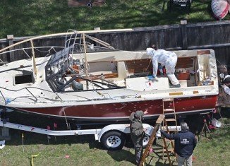 Two unnamed US officials have told the AP that Dzhokhar Tsarnaev was unarmed when police captured him hiding inside the boat