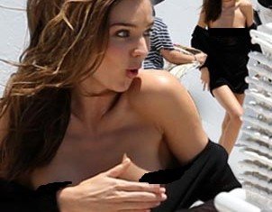 After years of perfectly posing for Victoria's Secret it seems Miranda Kerr accidentally reveals much more than she intended when shooting for her make-up range Kora Cosmetics