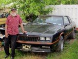 Amanda Berry's grandfather Troy Berry with the Chevrolet 1986 Monte Carlo, SS Nascar limited edition, that he promised her ten years ago