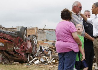 Barack Obama has visited the tornado-ravaged town of Moore in Oklahoma to comfort its victims