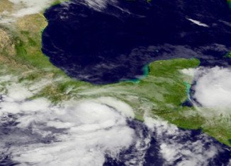 Hurricane Barbara has been lashing parts of Mexico's Pacific coast after making landfall near Salina Cruz