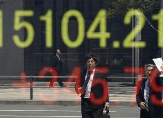 Japan’s shares have climbed past the 15,000 mark for the first time since January 2008, as the yen continues to weaken