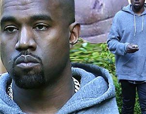 Kanye West hit his head on a caution sign on Friday while on a lunch date with Kim Kardashian