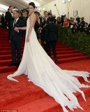 Katie Holmes revealed her bony back as she attended the Metropolitan Museum of Art's Costume Institute Gala on Monday night in New York City