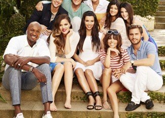 Lamar Odom appears in the Kardashian portrait to promote the new season of their hit reality show Keeping Up With The Kardashians