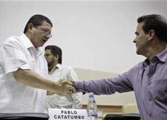 Left-wing FARC rebels and the Colombian government have agreed on land reform, after more than six months of peace talks