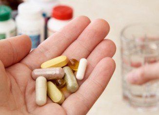 People who are taking antibiotics may benefit from taking probiotics at the same time