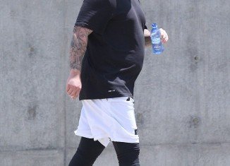 Rob Kardashian weighed 235 pounds in March and was throwing himself into daily work-outs but revealed he has now recruited Lamar Odom's trainer to help him shed