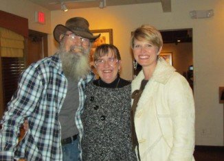 Si Robertson, his wife Christine and their daughter Trasa